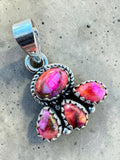 Making Waves Jewelry and Accessories artisan sterling silver pendant with a cluster of vibrant pink multi-faceted stones