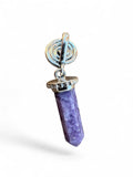 Making Waves Jewelry and Accessories purple crystal point pendant with silver spiral setting and beaded cap detail.
