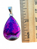 Making Waves Jewelry and Accessories teardrop pendant with purple and blue gemstone in a sterling silver bezel