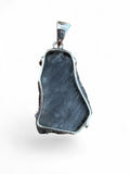 Making Waves Jewelry and Accessories raw pyrite pendant in a 925 sterling silver setting, back view.
