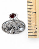 Making Waves Jewelry and Accessories oval tourmalinated quartz and garnet pendant in sterling silver with ruler scale
