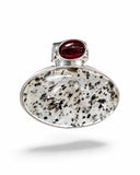 Making Waves Jewelry and Accessories oval tourmalinated quartz and red garnet pendant set in polished sterling silver.
