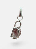 Making Waves Jewelry and Accessories raw Herkimer diamond crystal pendant in a minimalist sterling silver setting.