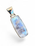 Making Waves Jewelry and Accessories rectangular moonstone pendant with blue flash in a 925 sterling silver bezel.