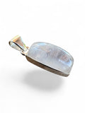 Making Waves Jewelry and Accessories rectangular moonstone pendant in a polished 925 sterling silver bezel setting.
