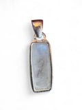 Making Waves Jewelry and Accessories rectangular moonstone pendant in a polished 925 sterling silver bezel setting.