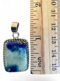 Making Waves Jewelry and Accessories rectangular blue and white stone pendant in a beaded sterling silver bezel