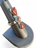 Making Waves Jewelry and Accessories artisan sterling silver statement ring with three red jasper stones on a display