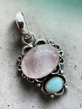 Making Waves Jewelry and Accessories pendant with oval rose quartz and larimar in oxidized sterling silver filigree.