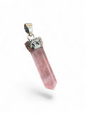 Making Waves Jewelry and Accessories rose quartz crystal point pendant with a vintage-inspired silver-tone metal cap.