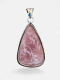 Making Waves Jewelry and Accessories teardrop rose quartz pendant in a polished sterling silver bezel setting.
