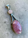 Making Waves Jewelry and Accessories rose quartz pendant featuring a large oval and small round stone in sterling silver