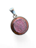 Making Waves Jewelry and Accessories round iridescent pink druzy pendant set in a 925 sterling silver bezel