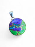 Making Waves Jewelry and Accessories round pendant featuring a vibrant purple, lime green, and turquoise mosaic in silver