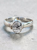 Making Waves Jewelry and Accessories oval rutilated quartz ring in polished sterling silver with unique needle inclusions