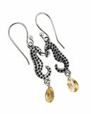 Making Waves Jewelry and Accessories silver seahorse drop earrings with dark accents and yellow crystal teardrops.