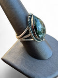 Making Waves Jewelry and Accessories teardrop Seraphinite ring in sterling silver with a twisted rope border detail.