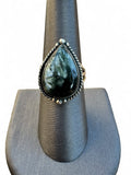Making Waves Jewelry and Accessories teardrop Seraphinite ring in sterling silver with rope and bead detailing.