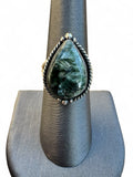 Making Waves Jewelry and Accessories teardrop Seraphinite statement ring in sterling silver with twisted rope border.