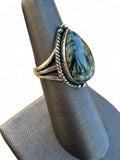 Making Waves Jewelry and Accessories teardrop Seraphinite ring in 925 sterling silver with a twisted rope bezel setting.