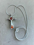 Making Waves Jewelry and Accessories silver cross pendant necklace with two teardrop amber stones on a delicate chain