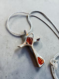 Making Waves Jewelry and Accessories silver cross pendant necklace with two teardrop amber stones on a delicate chain