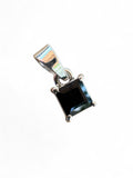 Making Waves Jewelry and Accessories sterling silver pendant featuring a square-cut black stone in a four-prong setting