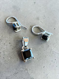 Making Waves Jewelry and Accessories sterling silver pendant and drop earring set with square-cut black stones