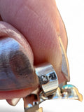 Making Waves Jewelry and Accessories sterling silver horseshoe pendant showing a 925 hallmark stamp on the bail