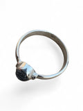 Making Waves Jewelry and Accessories sterling silver ring featuring a dark oval stone in a minimalist polished setting