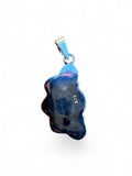 Back view of a Making Waves Jewelry and Accessories sterling silver pendant showing the 925 hallmark stamp.