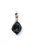 Back view of a Making Waves Jewelry and Accessories sterling silver pendant showing the 925 hallmark stamp.