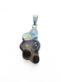 Back view of a Making Waves Jewelry and Accessories sterling silver pendant showing the 925 hallmark stamp.