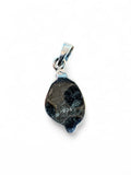 Back view of a Making Waves Jewelry and Accessories sterling silver pendant showing the 925 hallmark stamp.