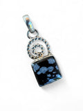 Making Waves Jewelry and Accessories square snowflake obsidian pendant with a sterling silver spiral and beaded detail.