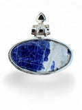 Making Waves Jewelry and Accessories oval sodalite and amethyst pendant in a sterling silver bezel setting.