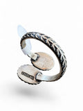 Making Waves Jewelry and Accessories sterling silver bypass ring with leaf-pattern band and stamped hallmark