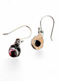 Making Waves Jewelry and Accessories sterling silver dangle earrings with burgundy and white stone inlay and beadwork.