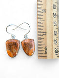 Making Waves Jewelry and Accessories handcrafted teardrop natural stone dangle earrings with sterling silver settings.