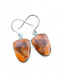 Making Waves Jewelry and Accessories handcrafted teardrop natural stone dangle earrings with sterling silver settings.