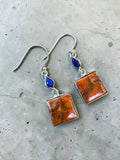 Making Waves Jewelry and Accessories sterling silver drop earrings with square orange stone and blue lapis accents.