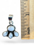 Making Waves Jewelry and Accessories sterling silver pendant with four milky-white stones and rope-style detailing.