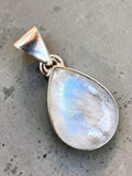 Making Waves Jewelry and Accessories teardrop moonstone pendant in polished 925 sterling silver with blue flash