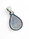 Making Waves Jewelry and Accessories teardrop moonstone pendant in a polished 925 sterling silver setting.