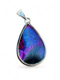 Making Waves Jewelry and Accessories teardrop pendant with a purple and blue dendritic gemstone in sterling silver