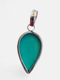 Making Waves Jewelry and Accessories teardrop pendant with a sea-foam green gemstone set in 925 sterling silver.