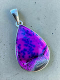 Making Waves Jewelry and Accessories teardrop pendant with a vibrant purple and blue gemstone in sterling silver