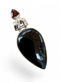 Making Waves Jewelry and Accessories teardrop pendant in 925 sterling silver with black onyx and triangular garnet