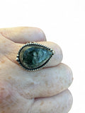 Making Waves Jewelry and Accessories teardrop Seraphinite ring in sterling silver with a twisted rope border.