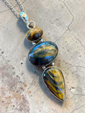 Making Waves Jewelry and Accessories triple stone pendant necklace featuring polished Tiger's Eye in sterling silver